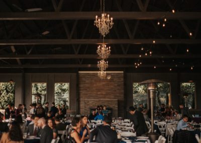 Guests of the wedding enjoying their company and food