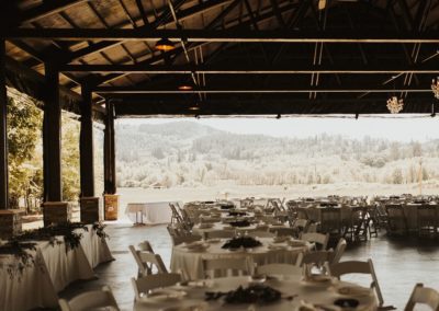 Dining tables and chairs in a large wedding hall