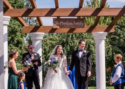 The bride and groom walking away from the altar together