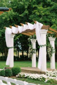 A canopy with cloth and flower designs
