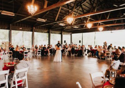 The bride and groom dancing intimately