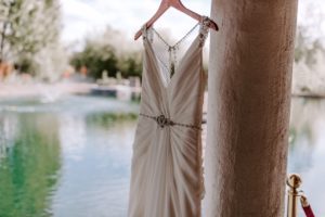 A dress of the bride fixed on a hanger