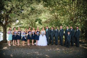 A bride and groom with their attendants