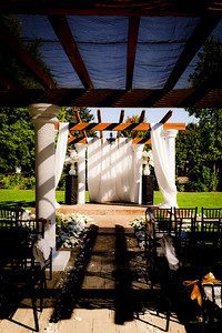 A wedding ceremony set up in a park.