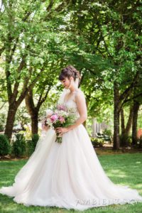 The bride looking at her flowers