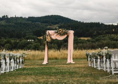 Flowers and cloth hanging from the arch