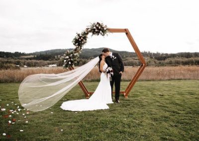 A bride and groom kiss