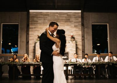 A newlywedded couple dancing