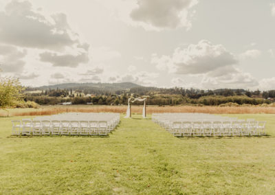 A view of the wedding arch and venue seats