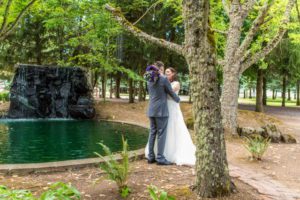 Newlyweds holding each other dearly