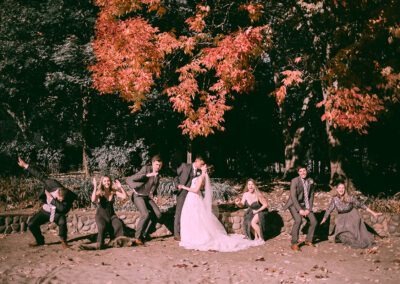 Newlyweds celebrating with their attendants