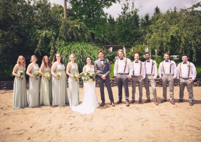 The newlyweds with their attendants